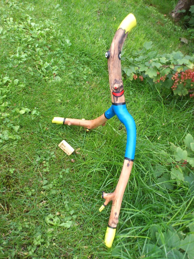 Holzfigur: Der Sprinter